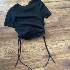 Women’s black crop top with tie ups on side